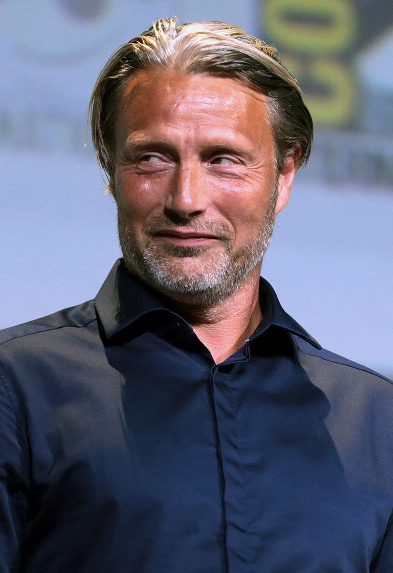 5) Another Round ⁣(2020): ​Mikkelsen shines as a middle-aged ⁣man⁢ who, along with ⁣friends, tests a theory that maintaining a ⁣constant ​level of alcohol ⁣in their blood will improve their lives